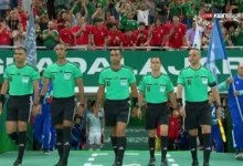 15 صورة للحكم أمين عمر في مباراة التشيك وكوريا الجنوبية بكأس العالم